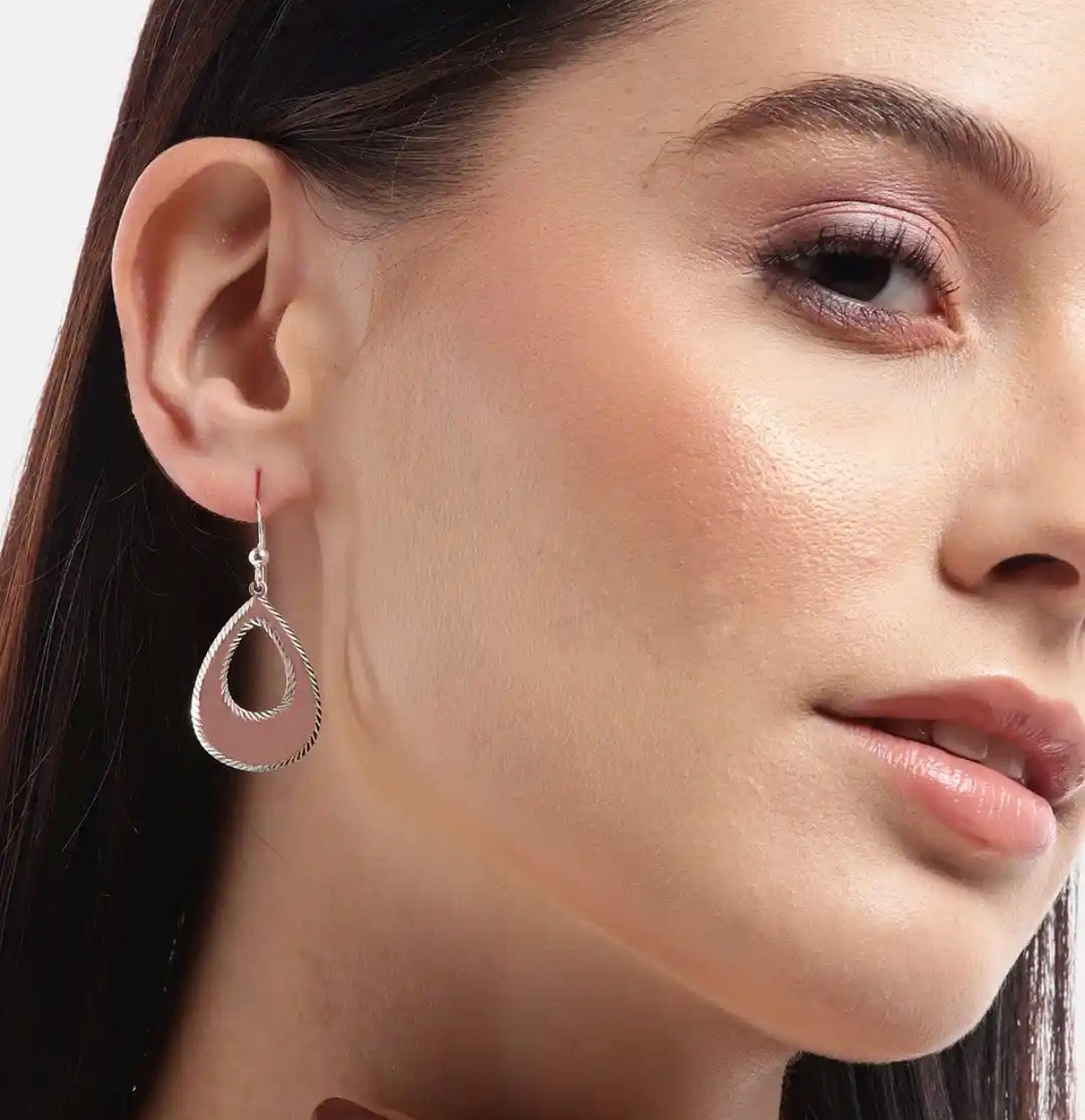 EVARA's Teardrop Aura Earrings