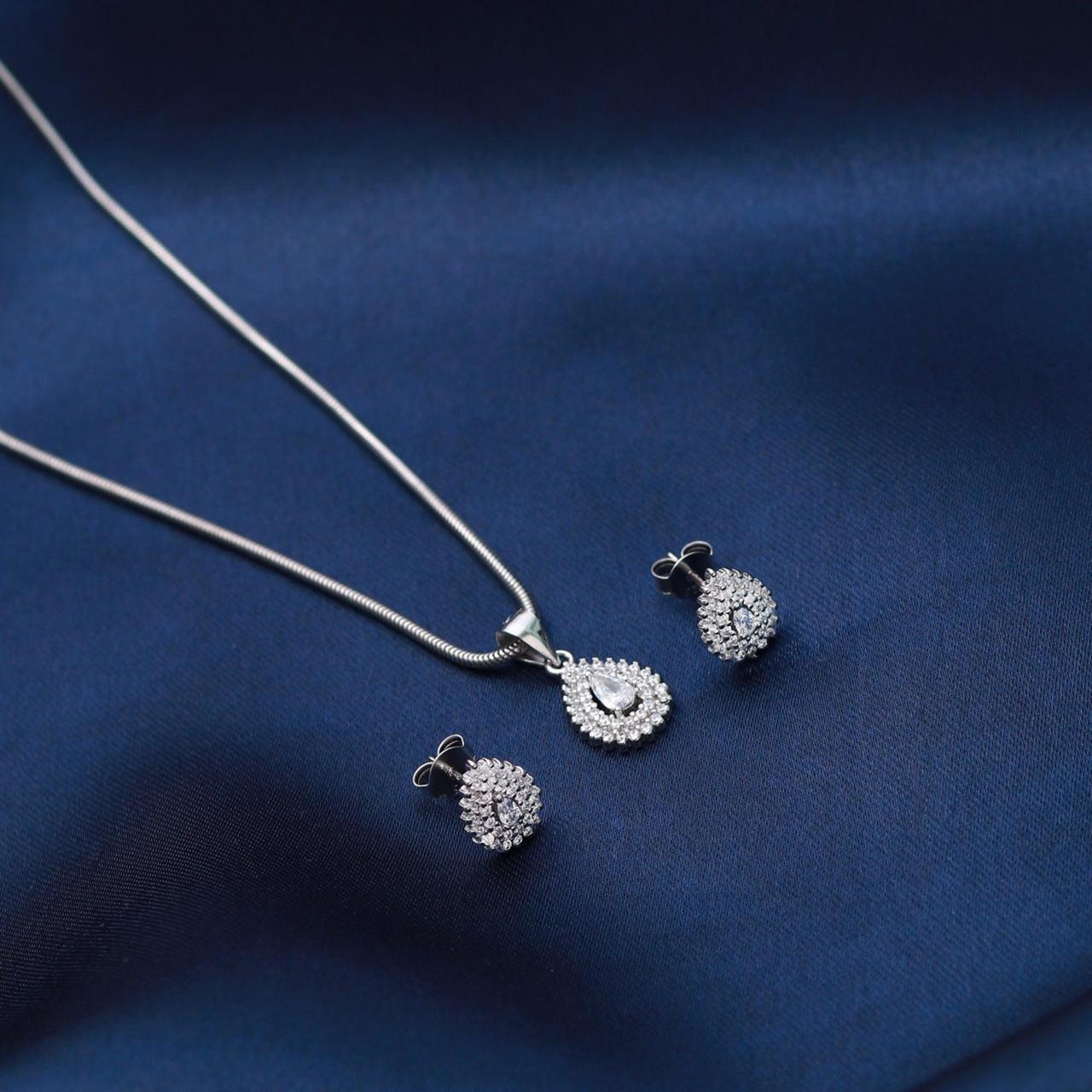 Evara's Teardrop Sparkle Pendant Earrings Set